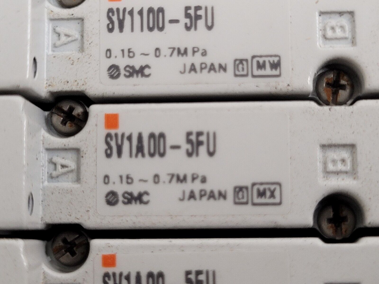 2x SMC Pneumatic Valve Block Lot w/19 valves SV1A00-5FU SV1100-5FU DIN Rail