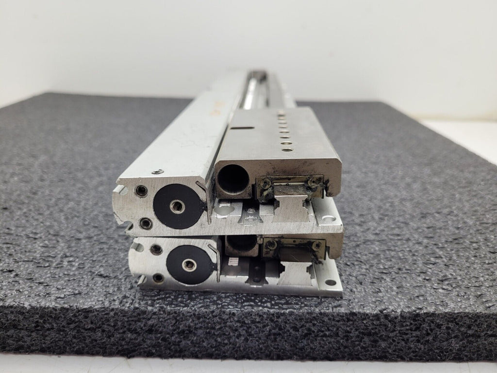 Lot of 2x FESTO SLG-18-275-YSR-A SA-208432 Linear Drive Air Actuator says: leaks