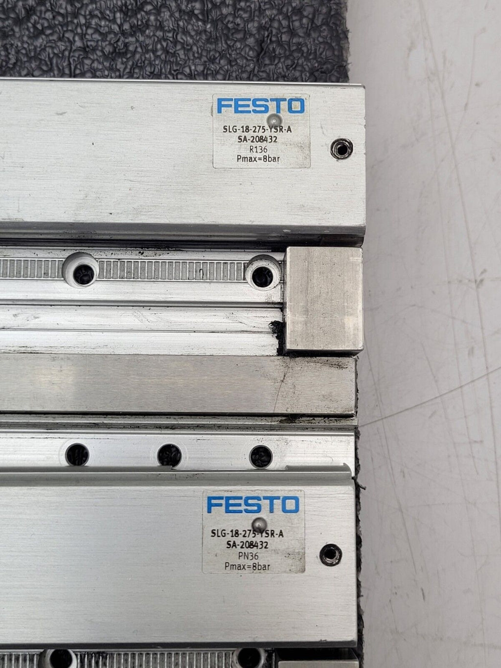 Lot of 2x FESTO SLG-18-275-YSR-A SA-208432 Linear Drive Air Actuator says: leaks