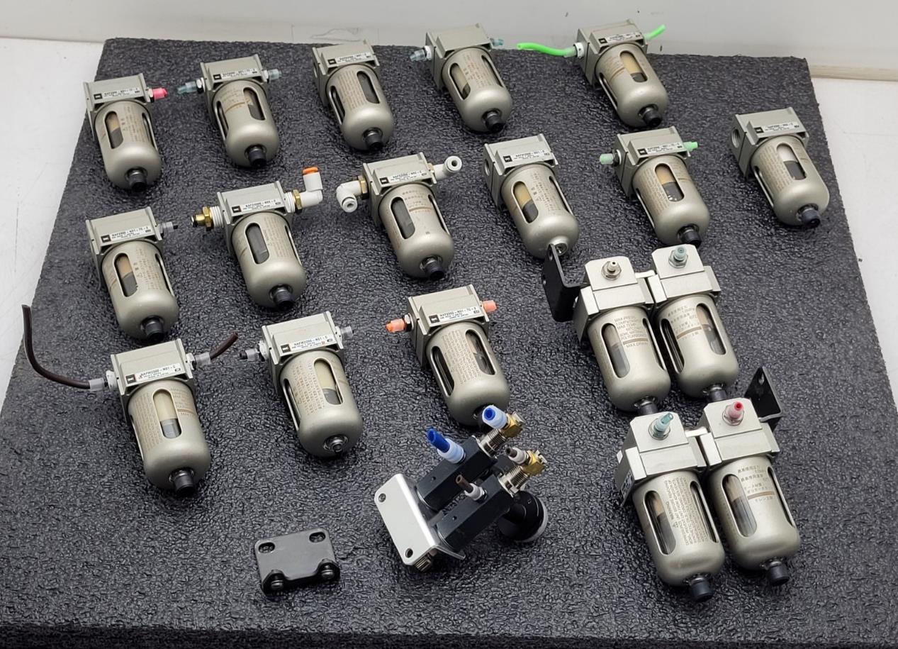 Lot of 18x  SMC Pneumatic Filter Assembly NAFM2000-N01-C + a Couple Regulators