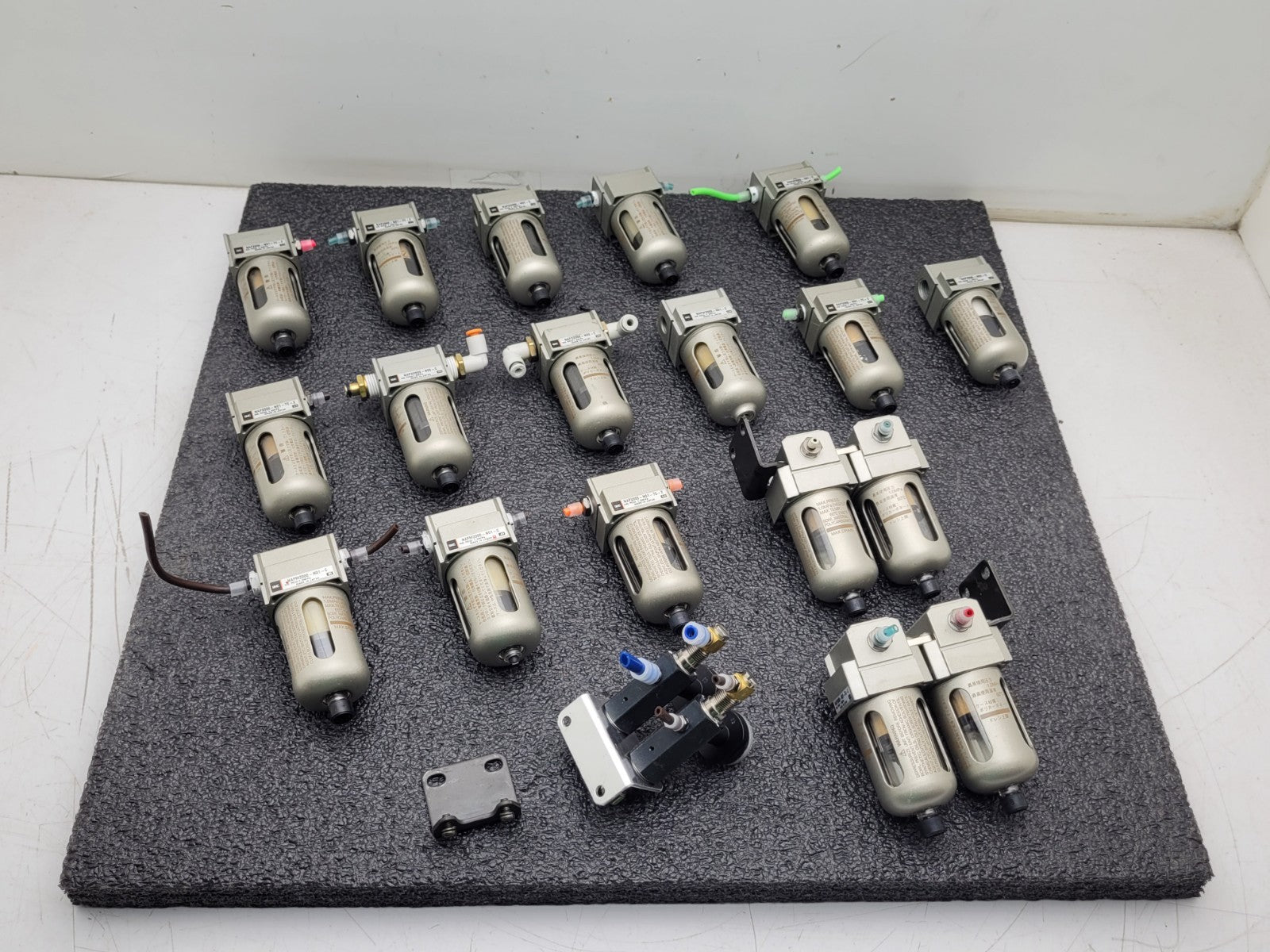 Lot of 18x  SMC Pneumatic Filter Assembly NAFM2000-N01-C + a Couple Regulators
