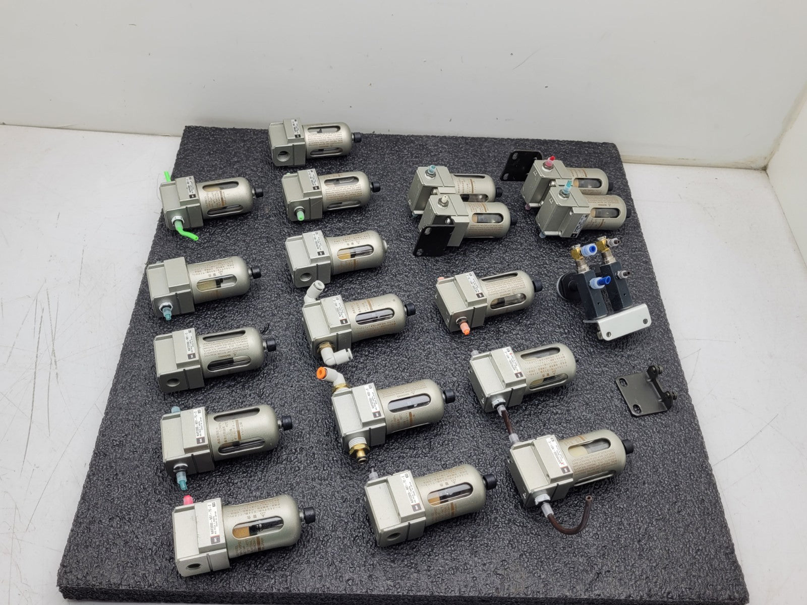 Lot of 18x  SMC Pneumatic Filter Assembly NAFM2000-N01-C + a Couple Regulators