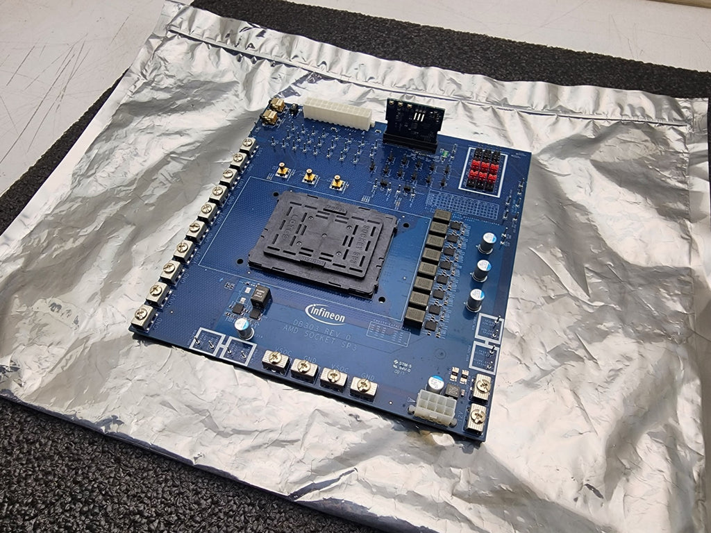 Infineon DB303 Rev 0 AMD Socket SP3 Development Board, needs a couple parts.