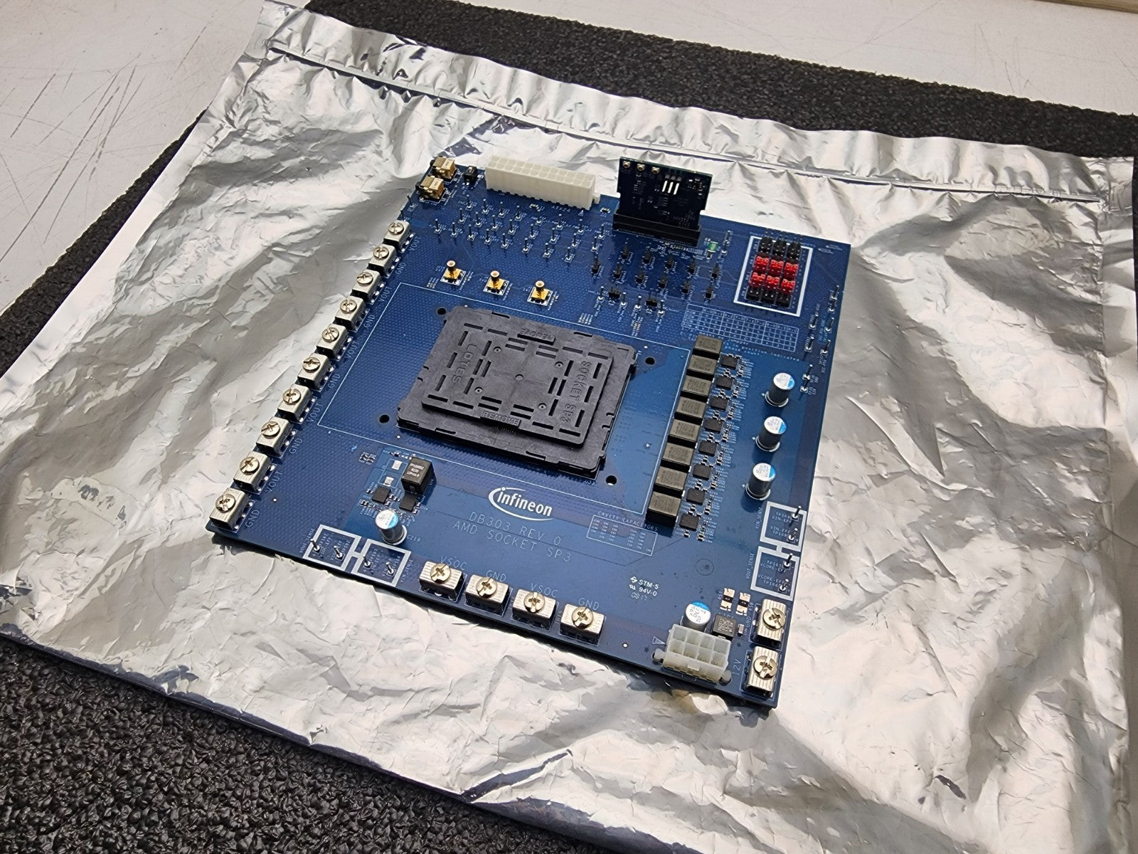 Infineon DB303 Rev 0 AMD Socket SP3 Development Board, needs a couple parts.