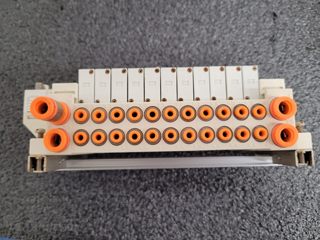 2x SMC Pneumatic Valve Block Lot w/19 valves SV1A00-5FU SV1100-5FU DIN Rail