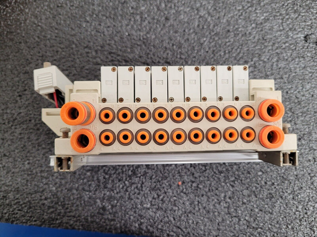 2x SMC Pneumatic Valve Block Lot w/19 valves SV1A00-5FU SV1100-5FU DIN Rail