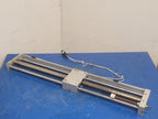 SMC CY1L25H-650-F79L Rodless Magnetic Coupled Guided Cylinder w/ D-F79 Sensors