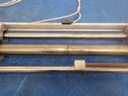 SMC CY1L25H-650-F79L Rodless Magnetic Coupled Guided Cylinder w/ D-F79 Sensors