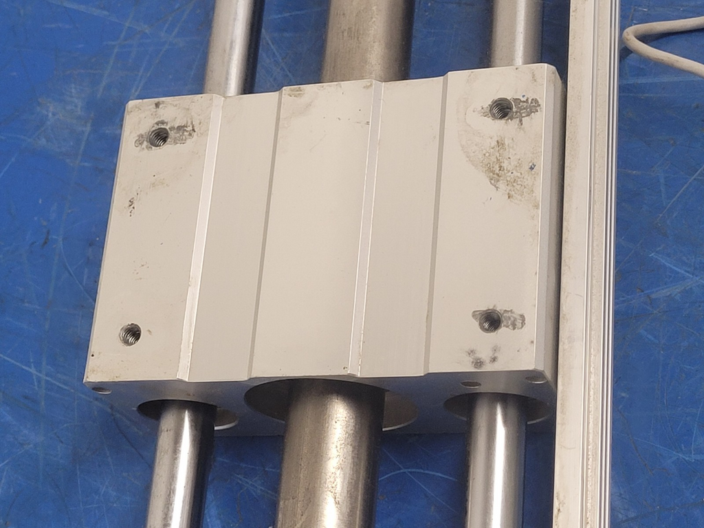 SMC CY1L25H-650-F79L Rodless Magnetic Coupled Guided Cylinder w/ D-F79 Sensors